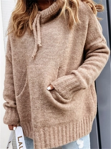 Women's oversized tan knit hoodie with kangaroo pocket and ribbed drawstring hood