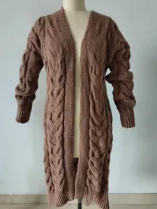 Close-up of thick brown cable knit texture on a long winter cardigan sweater for women