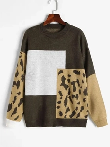 Detail of loose-fit color-block knit sweater with leopard print in dark green and khaki
