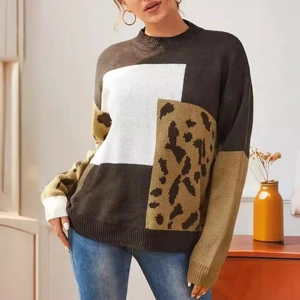 Women's crewneck knit sweater featuring casual color block patchwork and leopard print pattern