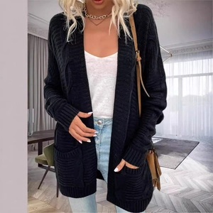 Women's black cable knit cardigan with long sleeves and side pockets in a loose casual fit