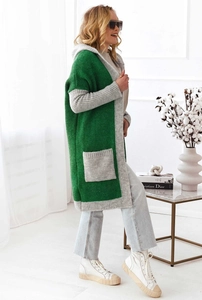 Macro shot showing green knit texture and grey pocket detail on women's cardigan