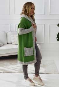 Detail view of women's long hooded cardigan with green and gray knit color-block pattern