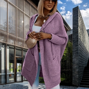 Close-up of a purple knit hooded cardigan showing large pockets and ribbed cuffs