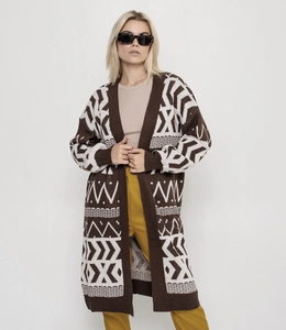 Detailed view of heavy knit texture with geometric bohemian patterns in brown and cream