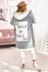 Detail view of hooded knit cardigan back featuring contrast white BE COOL graphic design