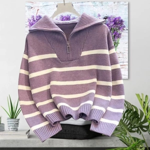 Women's purple and white striped knit sweater with half-zip collar and loose fit