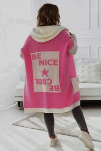 Back view of pink and beige oversized hooded knit cardigan featuring BE NICE stars pattern