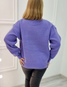 Detail view of the lavender purple knitted sweater back with ribbed cuffs and drop shoulder