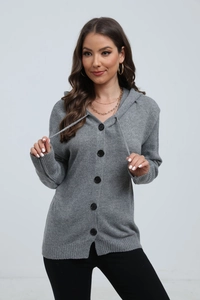 Detail of grey knitted hooded cardigan with black contrast buttons and drawstring hood