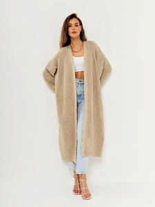 Detail of chunky knit texture on long oatmeal beige cardigan for women in minimalist style