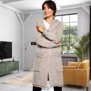 Long hooded knit cardigan in light oatmeal with large front pockets and rolled cuffs
