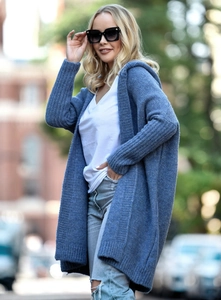 Close-up of textured grey-blue hooded knit cardigan with loose batwing sleeve design