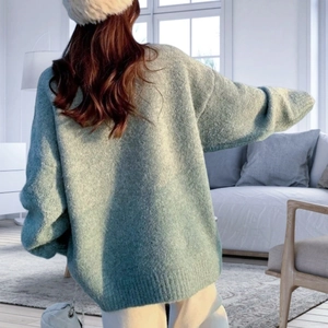 Cozy mint green oversized knit sweater with casual round neck and split hem for women