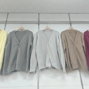 Detail showing plush mink-like V-neck cardigans in yellow, grey, white, khaki and burgundy