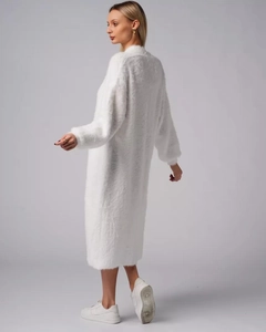 Detailed view of the plush white mink-like knit cardigan with a fuzzy texture and long cut