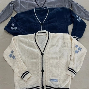 Women's V-neck knit cardigan with embroidered stars and contrast trim in multiple colors