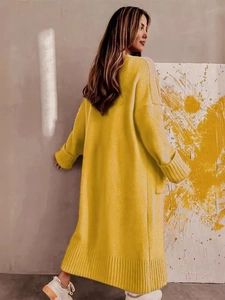 Long yellow knitted cardigan with oversized fit and ribbed cuffs for women