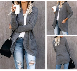 Three-way view of a grey waffle knit cardigan with open front and large front pockets