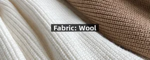 Dettaglio macro della maglia a coste in cashmere di pecora bianco e cammello soffice