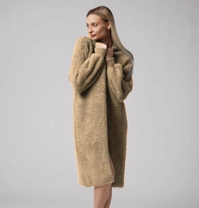 Detail of soft faux mink fur knit cardigan in khaki showing the plush ribbed sleeve cuff