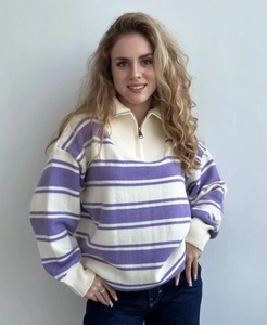 Detail of half-zip polo collar and purple striped knit texture on women's sweater