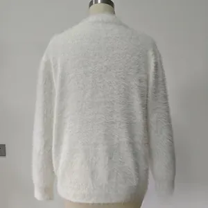 Detailed texture of white faux mink fur material on loose-fit knitted cardigan sweater