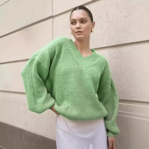 Oversized V-neck light green knitted sweater for women with ribbed cuffs and hem