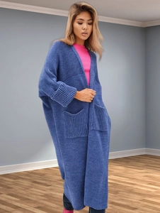 Detailed knit texture of navy blue long cardigan featuring oversized fit and large pockets