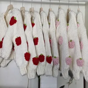 White chunky knit V-neck cardigan with 3D handmade crochet strawberry decorations