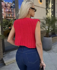 Detailed knit texture and back view of a slim fit fuchsia V-neck sleeveless cardigan vest