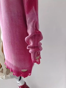 Distressed pink oversized knit sweater for women with vintage ripped details