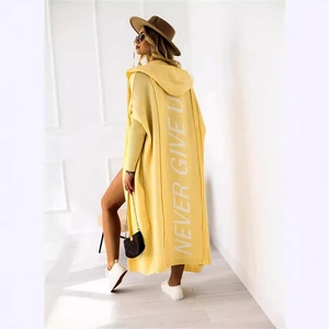 Long yellow hooded knit cardigan featuring white NEVER GIVE UP vertical back print