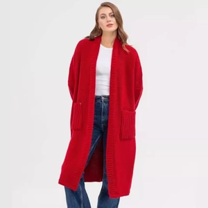 Women's long knit cardigan in vibrant red with large pockets and a relaxed fit