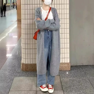 Grey long knit cardigan sweater for women in a casual loose fit and ankle length style
