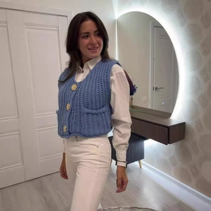 Women's sky blue V-neck knitted vest with gold buttons and side pockets in casual style