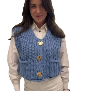 Women's V-neck knit vest in sky blue featuring gold buttons and front pockets