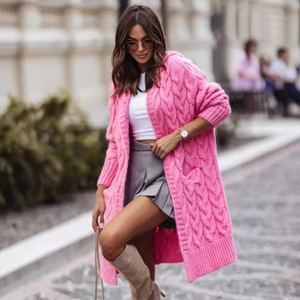 Pink oversized chunky knit cardigan with hood and front pockets for casual street style