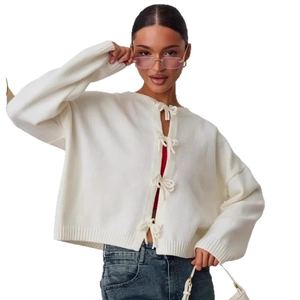 White long sleeve knit cardigan with front bow ties and ribbed cuffs for women
