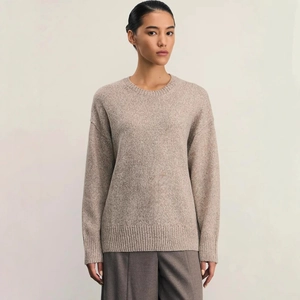 Oatmeal knit sweater with round neck and drop shoulder design for autumn winter fashion