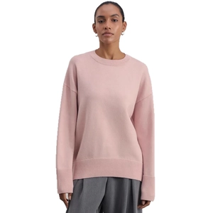 Women's crewneck long sleeve knit sweater in dusty rose pink with ribbed cuffs and hem