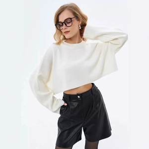 White oversized cropped knit sweater with round neck and drop shoulders for women