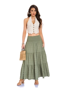 Detail of high waist tiered maxi skirt with smocked elastic waist and pocket feature