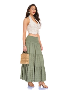 Detail of bohemian smocked high waist green tiered maxi skirt with elastic waistband
