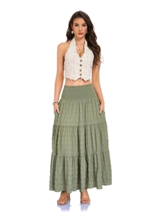 Detail of high waist olive green tiered maxi skirt with smocked elastic waistband and pockets