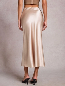 Elegant champagne satin midi skirt featuring a ruched texture and a silky smooth finish