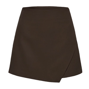 Detail view of dark coffee wrap skort with asymmetrical A-line design and flat waistband