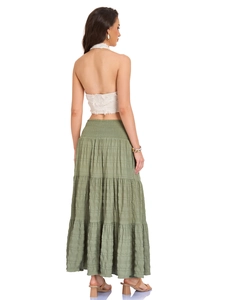 Rear view of bohemian smocked waist tiered maxi skirt and halter backless top set