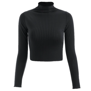 Detail of black ribbed knit long sleeve crop top with high neck and slim fit texture