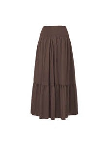 Detail of high waist tiered A-line skirt in dark brown cotton linen with pockets
